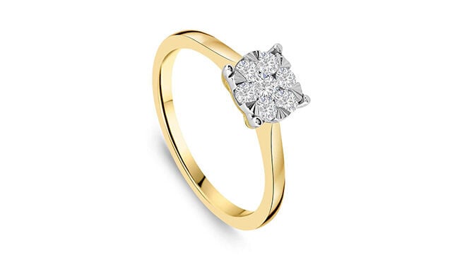 Yellow gold illusion-set diamond solitaire cluster engagement ring